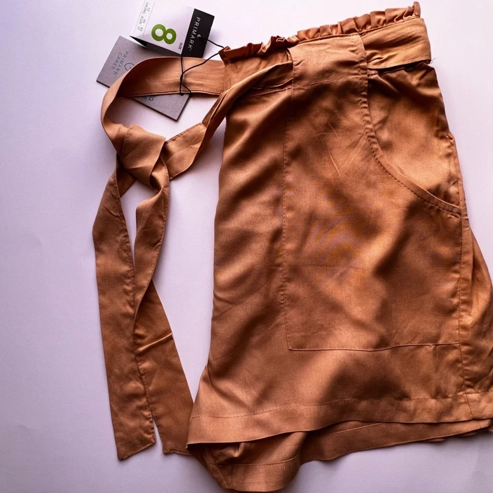 Dress shorts, yellow size 8 . PRIMARK CARES